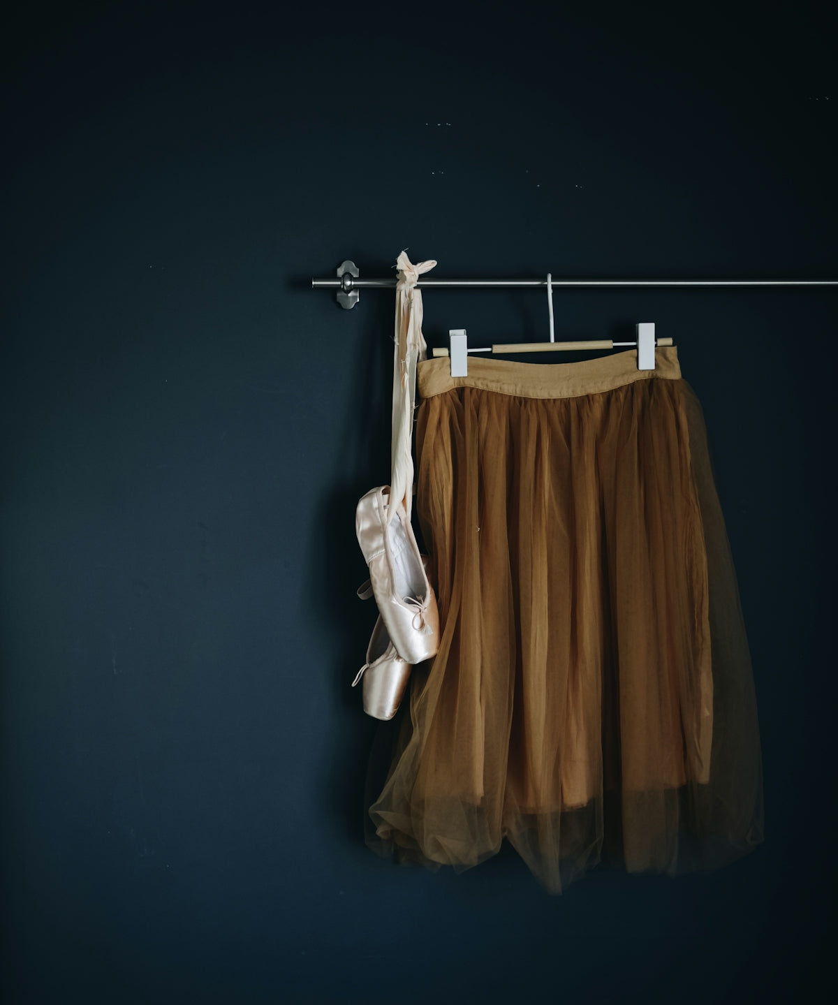 brown skirt hanged on wall