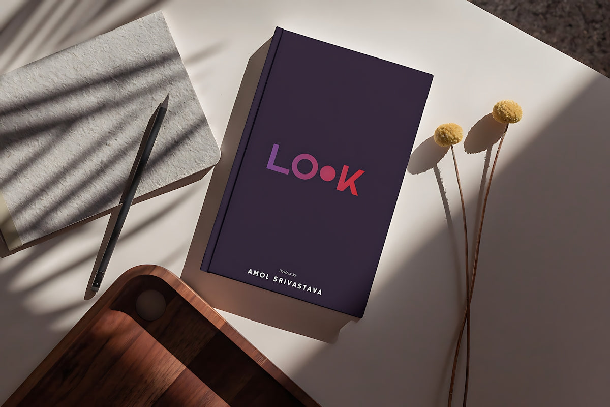 A book with the word look on a table.